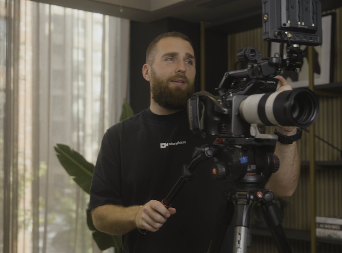 Camera operator filming on location